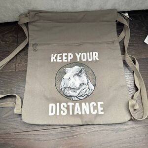 Universal Studios Jurassic Park Keep Your Distance Dinosaur Backpack New